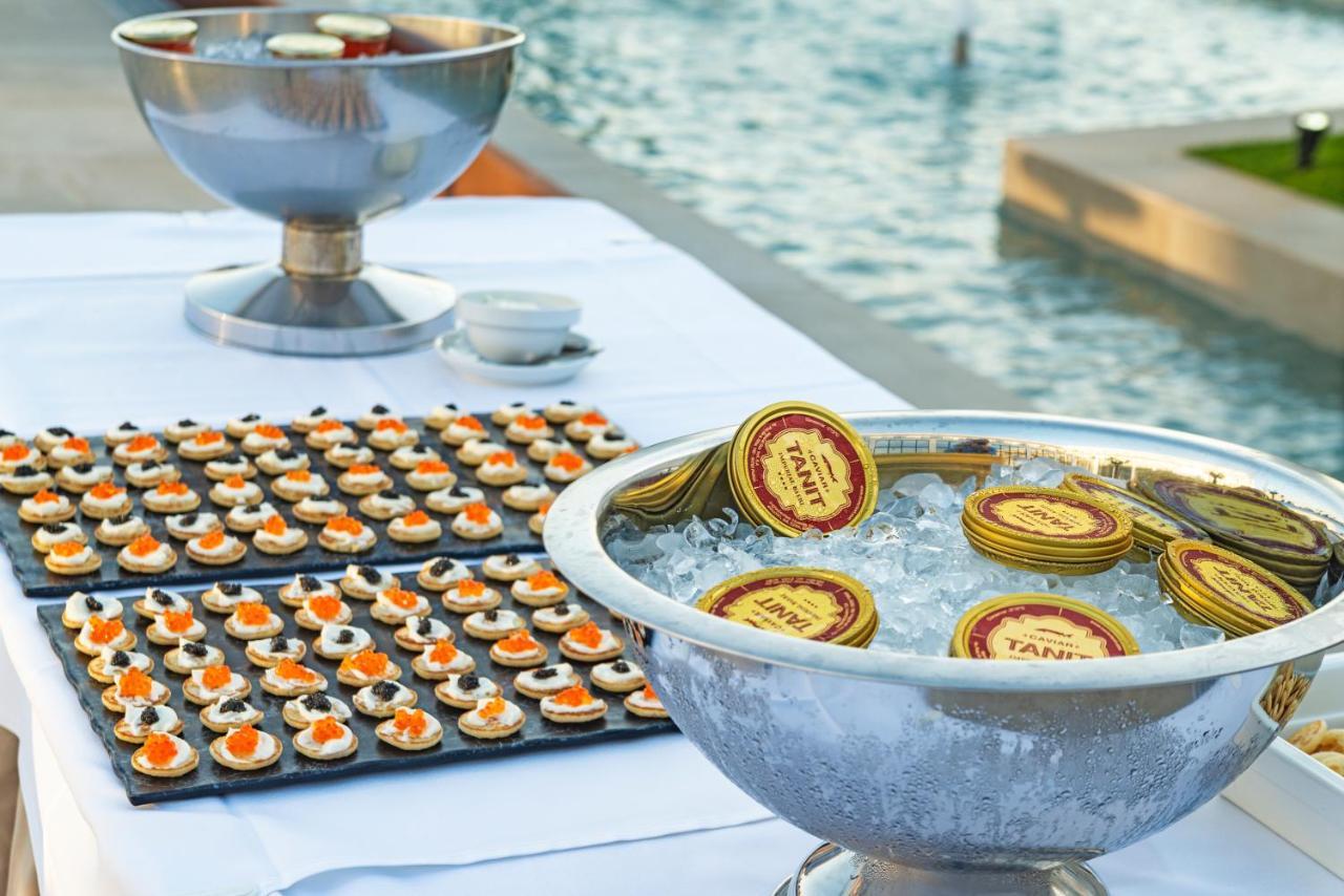Cabogata Beach Hotel Retamar  Bagian luar foto Caviar and chips at a party